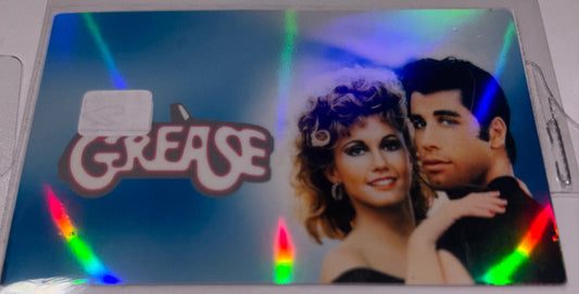 Grease Blue background 