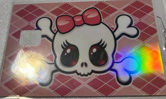 Pink skeleton with bow 